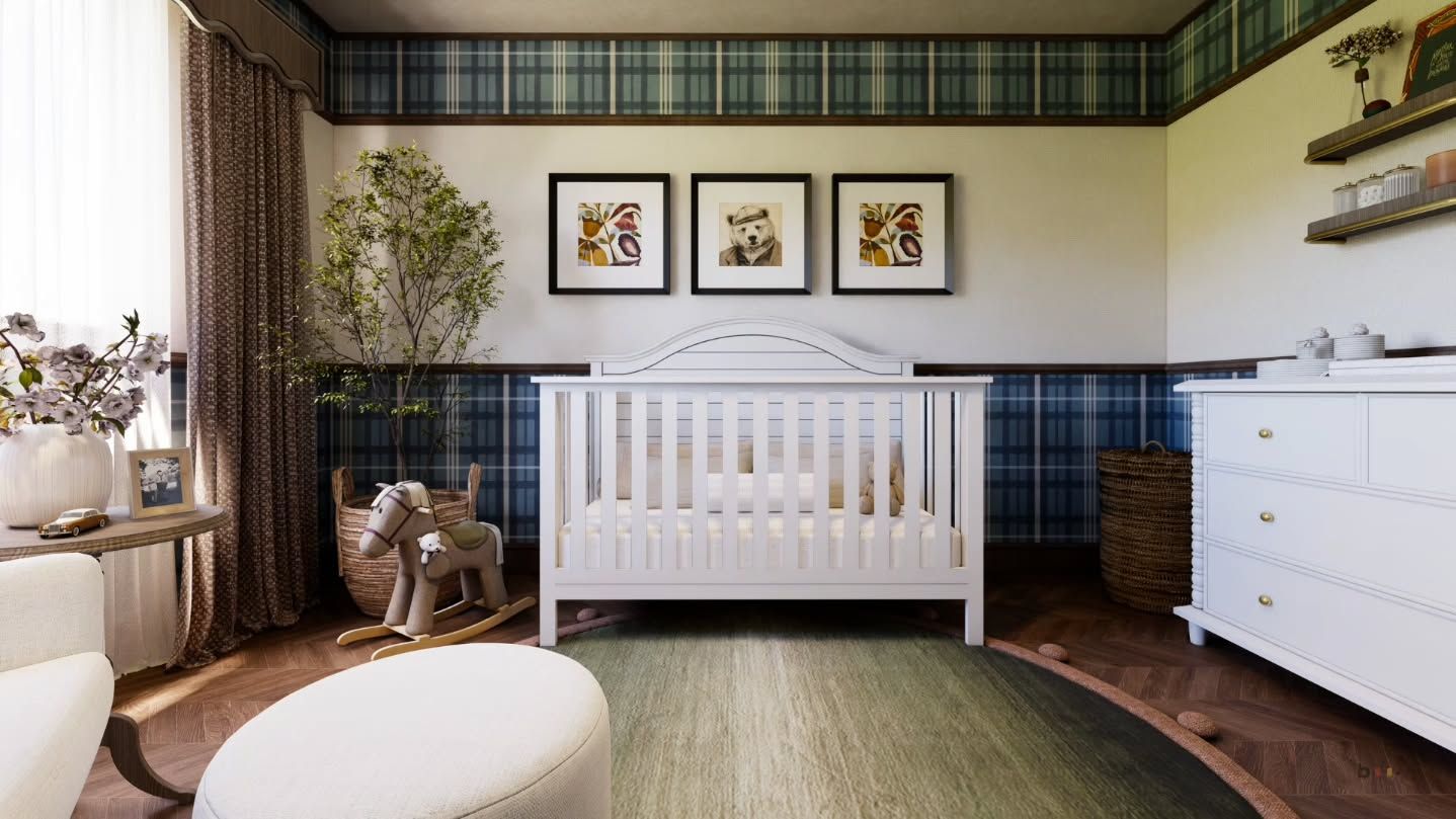 Cuna y cómoda con detalles de cuadros en la habitación infantil